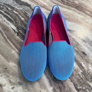 Rothy lounge loafer in blue with pink stitching